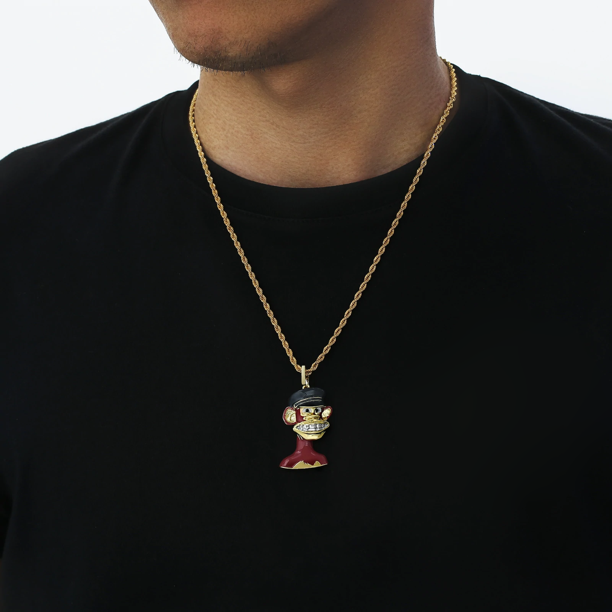 Big Daddy Bored Ape NFT pendant #6 worn on gold chain against black shirt