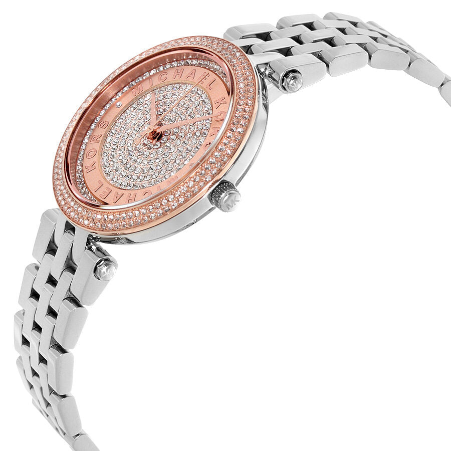 Side angle view of Michael Kors Mini Darci watch showing rose gold case and silver bracelet