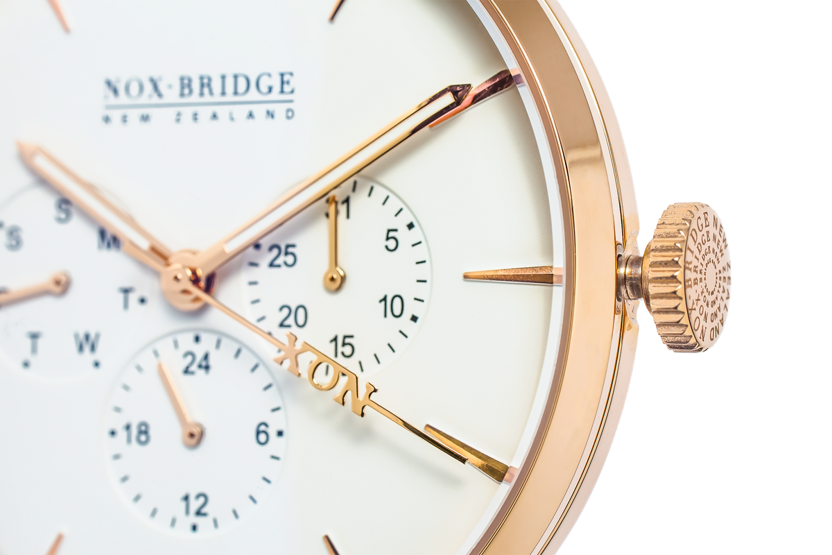 Noxbridge Classic Capella rose gold chronograph watch angled view showing crown, subdials, and case profile