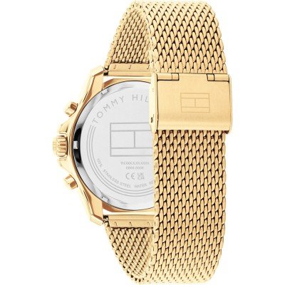 Caseback of Tommy Hilfiger gold chronograph watch with specifications and branding