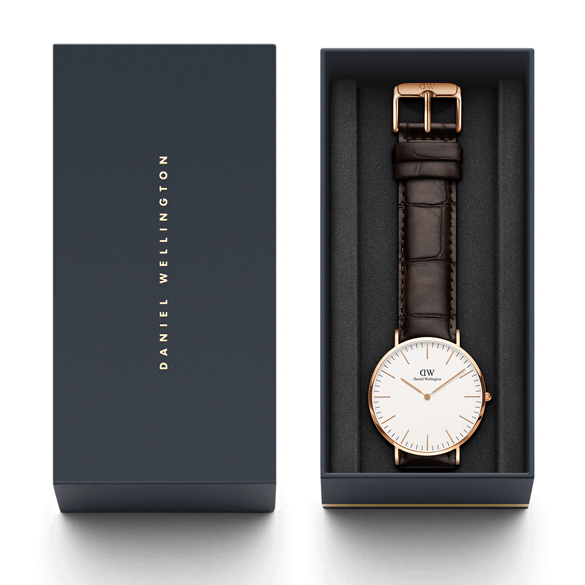 Daniel Wellington York watch and accessories displayed in branded navy gift box with manual