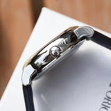 ساعة إمبوريو أرماني ميكانيكو أوتوماتيكية بحزام جلدي أسود ومينا أسود، موديل لويجي AR60040