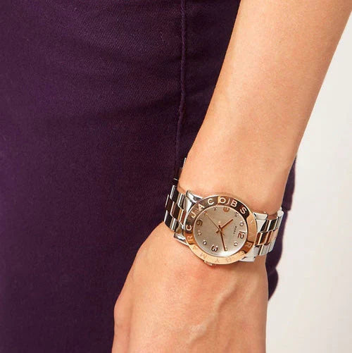 Marc by Marc Jacobs Blade watch worn on wrist with white dial and rose gold accents
