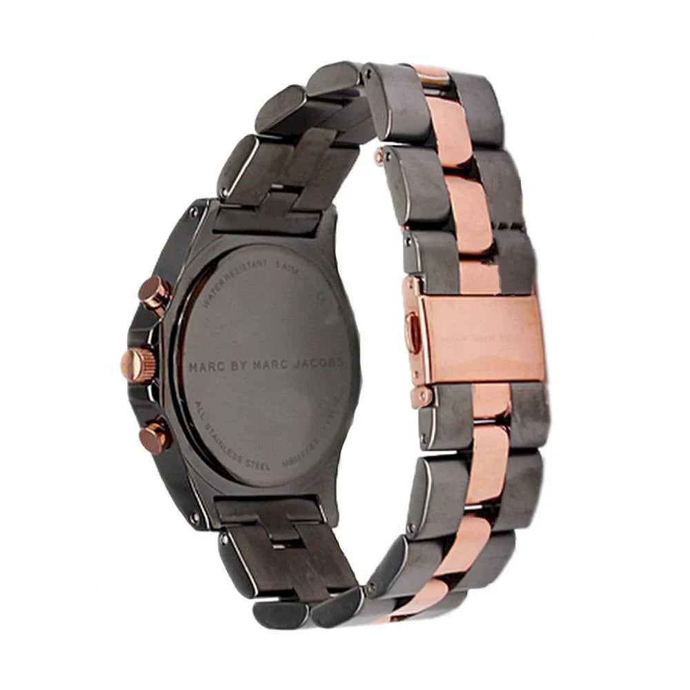 Side view of Marc by Marc Jacobs Blade watch showing two-tone stainless steel bracelet and case
