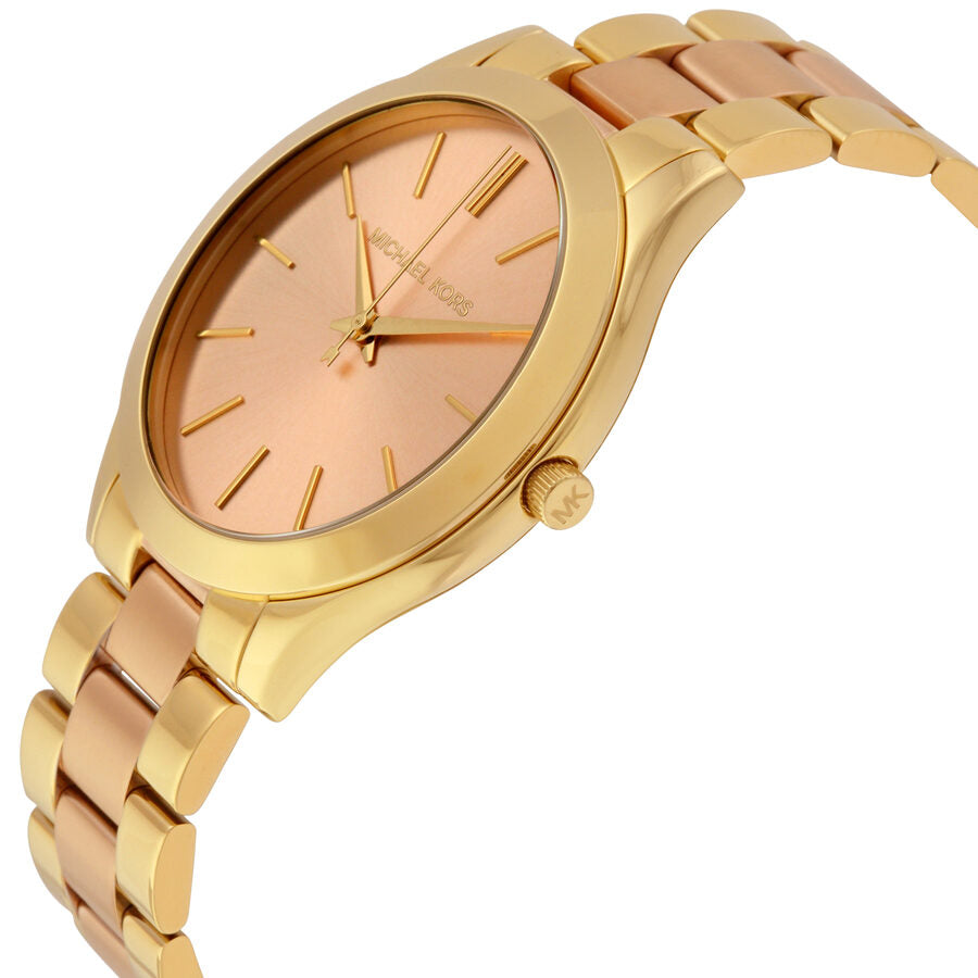 Michael Kors Slim Runway watch angled view showing pink dial and two-tone metal bracelet