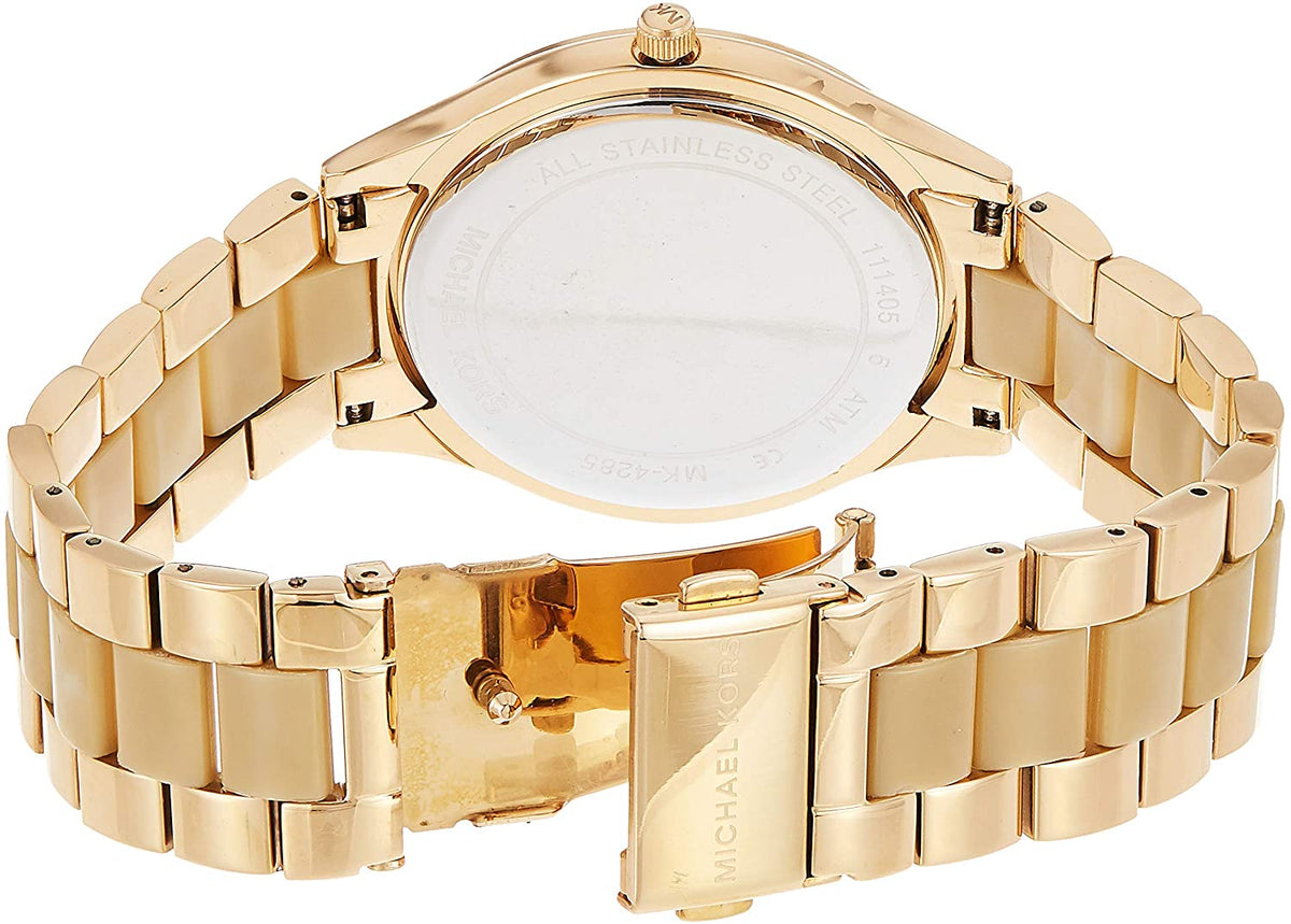 Michael Kors Slim Runway watch caseback showing gold-tone stainless steel bracelet