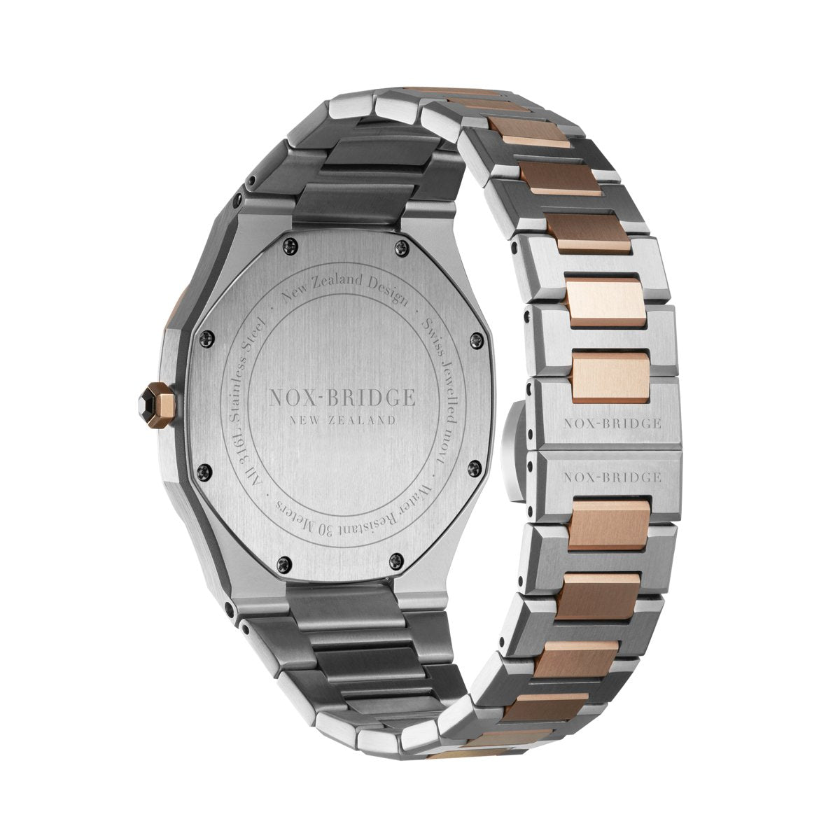 Noxbridge Revo two-tone watch caseback showing engraved detail and bracelet
